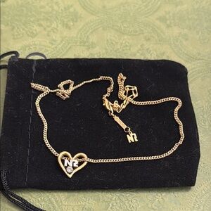Nina Ricci logo necklace